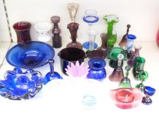 Twenty-eight pieces of coloured glassware including Bristol blue bowl, bells, opaline goblet,