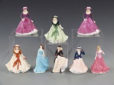 Eight Royal Worcester figures to include Poppy, Victoria, Elizabeth, Amelia, Zara, Sarah and