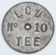 Edwardian Ladies Golf Union cast metal circular No.10 tee plaque, diameter 15cm