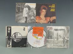 Approximately 60 singles including The Smiths (9), Bowie (20), Oasis (3), The Cure, 2 Tone etc