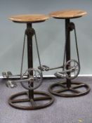 A pair of industrial style bar stools with bicycle pedal foot rests and chains H70cm