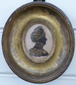 Early 19thC silhouette with gilt highlights in the style of Miers titled verso of Mrs Coles aged 74,