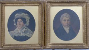 Pair of Victorian oil on board portraits, lady and gentleman in period dress, both with typed