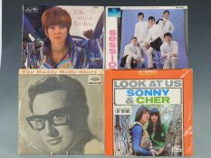 Early sixties and late fifties - approximately 150 LPs plus box sets including Sonny and Cher, Buddy