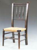 19th century country style, child's rushed seated chair, with turned decoration.