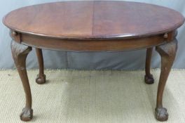 Victorian style mahogany dining tables with extra leaf raised on cabriole legs and ball and claw