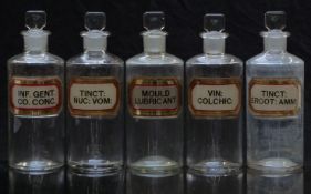 A set of five chemists/ pharmacy glass apothecary bottles with gilt labels including Vin Colchi