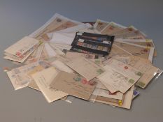A box of covers and postcards, all reigns including early issues, also stockcards of GB stamps