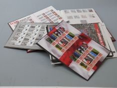 A stockbook of mint GB QEII stamps, singles, blocks, mini sheets, machins, smilers etc