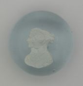 Glass paperweight decorated with a sulphide cameo in the form of Queen Victoria and Prince Albert,