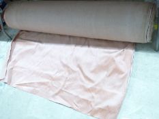 A large bolt of pink velour material / cloth with hemmed edges, haberdashery / textile /
