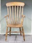 An elm seated Windsor arm chair