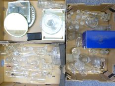 Over fifty pieces of clear glassware including a sherry barrel on stand, oil bottles, salad servers,