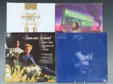 Approximately 110 LPs including Madonna, Simon and Garfunkel, The Kinks, Elton John and Joni