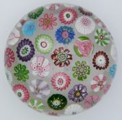Clichy spaced millefiori glass paperweight with various multi-coloured canes and roses, 77.5mm in