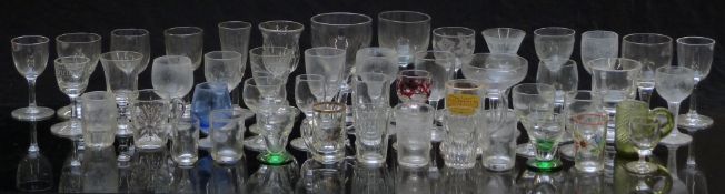 Forty nine 19thC and later miniature drinking glasses some with cut decoration or engraved and