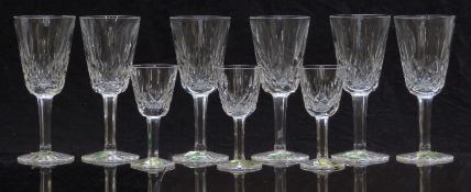 A set of six Waterford Crystal Lismore pattern port glasses, 13cm tall together with three