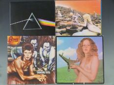 Approximately 40 LPs including Pink Floyd, Led Zeppelin, Bowie, Cream, Beatles, Yes, Blind Faith and