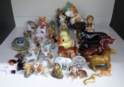 Collection of animals including Wade Disney, Gobel, Beswick, glass etc