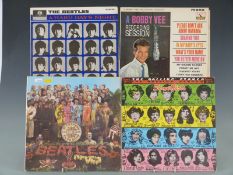 Approximately 50 LPs including The Beatles,Elvis, Bobby Vee etc