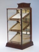 Onoto Pens glazed shop display cabinet with three inclined shelves behind bevelled glass panels
