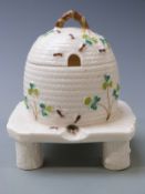 Belleek honey dish on stand, 15cm tall
