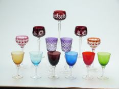 Two pairs of flash overlaid cut glass hock or wine glasses, largest 20.4cm tall, together with three