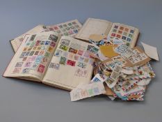 Three various stamp albums, all periods and a quantity of loose stamps