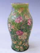 Devon pottery hand decorated vase impressed Liberty and Co to base, 21cm tall