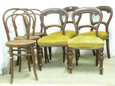 Set of six Victorian mahogany balloon-back dining chairs and three other cane seated chairs