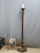 Standard lamp and a swing frame mirror