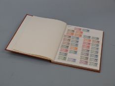 A stockbook of omnibus stamps - 1946 Victory, 1937 Coronation and others