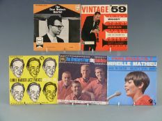 Approximately 70 EPs and 30 singles from the 1950s and 60s including some jazz