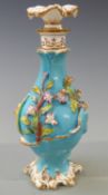 Coalbrookdale style porcelain scent bottle and stopper with applied flower decoration, 19.5cm tall