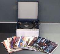 Bush c1970 model RP73 record player in blue finish, together with some easy listening LP records