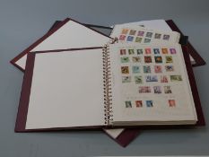 Stanley Gibbons New Zealand stamp album 1855-1990 and an album 1990-2000, together with two albums