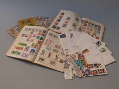 Welcome stamp album of all world stamps and four other albums