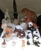 A collection of Lomonosov / USSR animal and bird figures some larger examples including leopard, fox