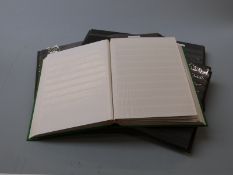 Seven large empty stockbooks, either new or little used and one smaller example