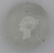 Glass paperweight decorated with a sulphide cameo in the form of Queen Victoria, 63mm in diameter.