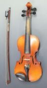 Suzuki child's violin with 23.5cm one piece back, 1/10 size, 1982 to label, with bow stamped
