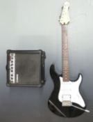 Yamaha Pacifica electric rhythm guitar with Yamaha GA-15 practice amplifier, both finished in black,