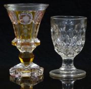 A 19thC flash overlaid cut glass goblet with engraved decoration, 16.3cm tall together with a