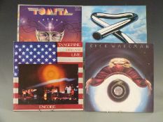 Approximately 50 albums including Mike Oldfield, Rick Wakeman, Tangerine Dream etc