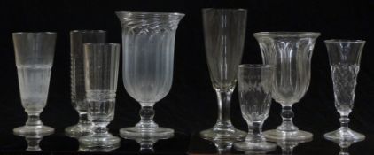 Eight 19thC and later clear glass vases or large goblets, some with cut decoration and one with of