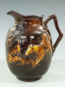 Royal Doulton Kingsware jug with relief moulded decoration of a huntsman and hounds, 18cm