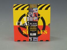 The Clash - the Singles (82876876287) 2006 box set of 19 singles and book. As new not sealed