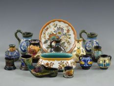 Gouda pottery small vases, a pair of ewers, shoe and a small jardiniere, tallest 13.5cm