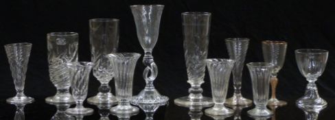 Twelve various 19thC and later drinking glasses all with wrythen decoration one Venetian style