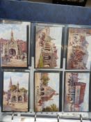 An album of Tuck's oilette postcards comprising sets by A R Quinton, who only painted 48 pictures